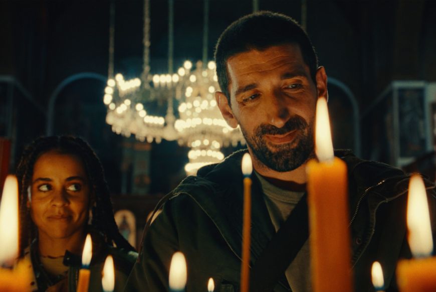 two people looking at candles